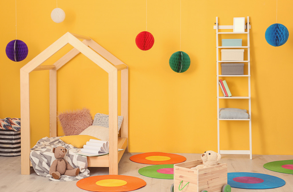 Kids room paint ideas with bright and cheerful orange color